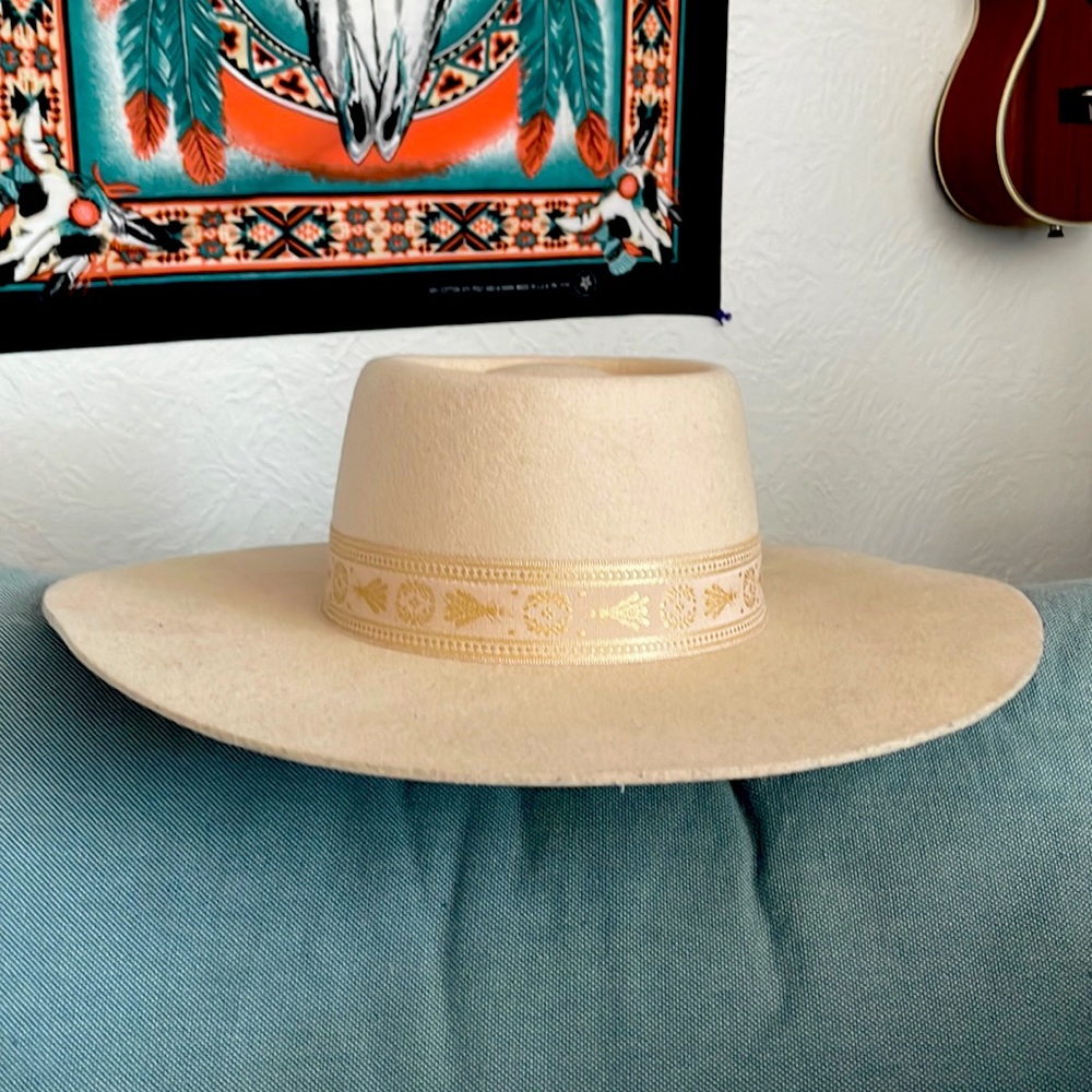 Slightly too small for my head when I wear my natural curl. Worn once